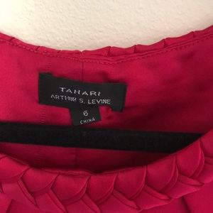 Designer dress, very classy, professional, and sexy all at once.